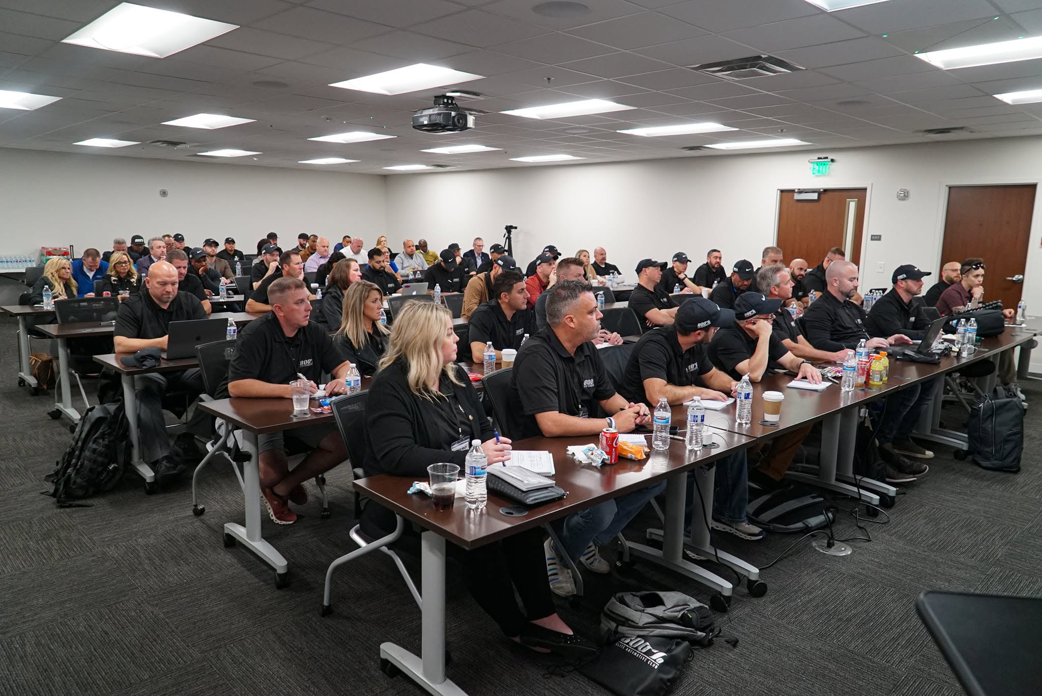 800% automotive leaders gathered together